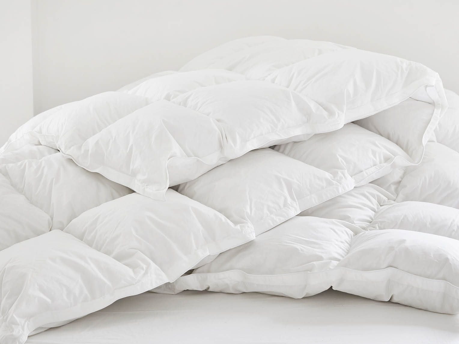 Täcke av återvunnen dun vinter